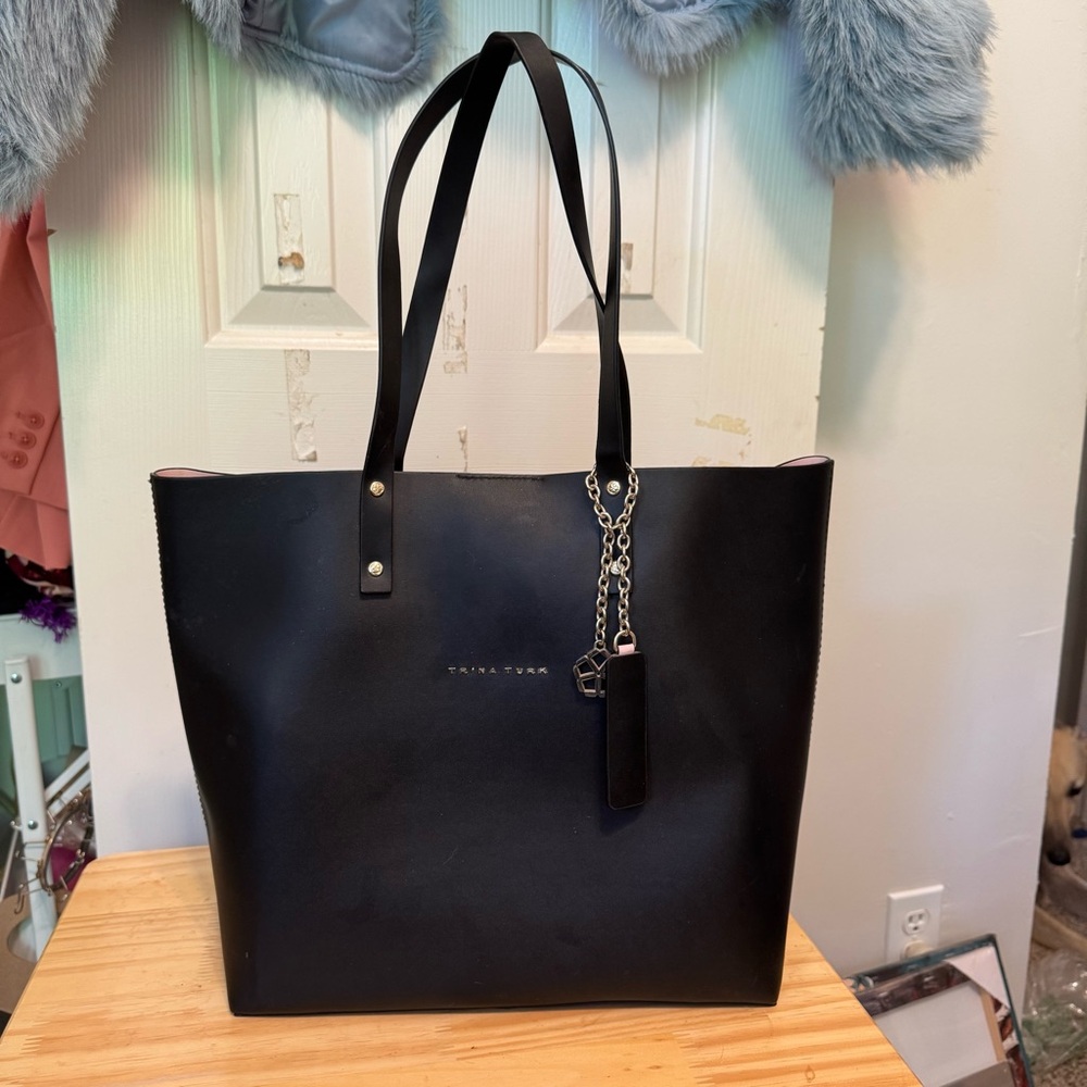 Trina Turk Elegant Black and Light Pink Tote with Chain Accent